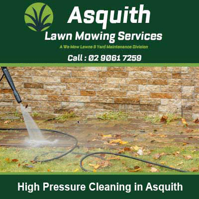 Pressure washer cleaning a brick wall in Asquith