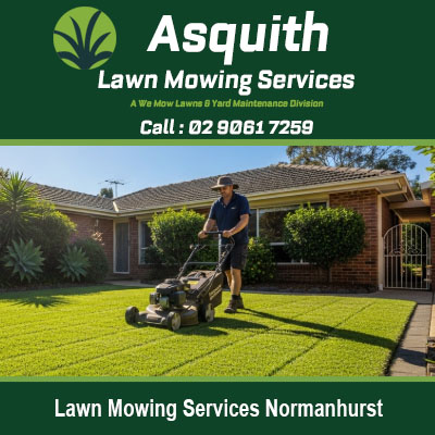 Professional lawn mowing services at Normanhurst NSW with gardener using push mower on residential lawn
